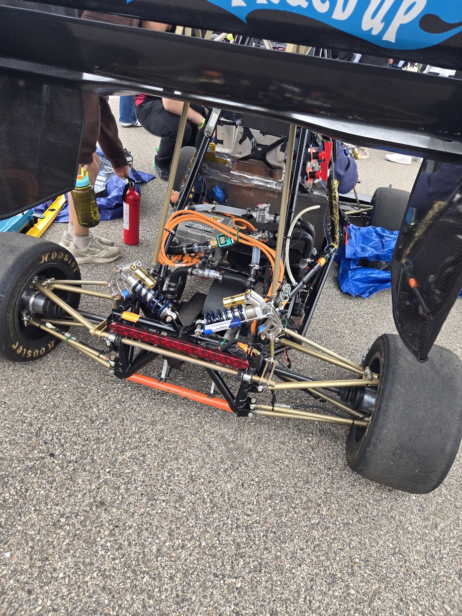 Bronco Racing students working on and presenting their Formula SAE car, photo 1