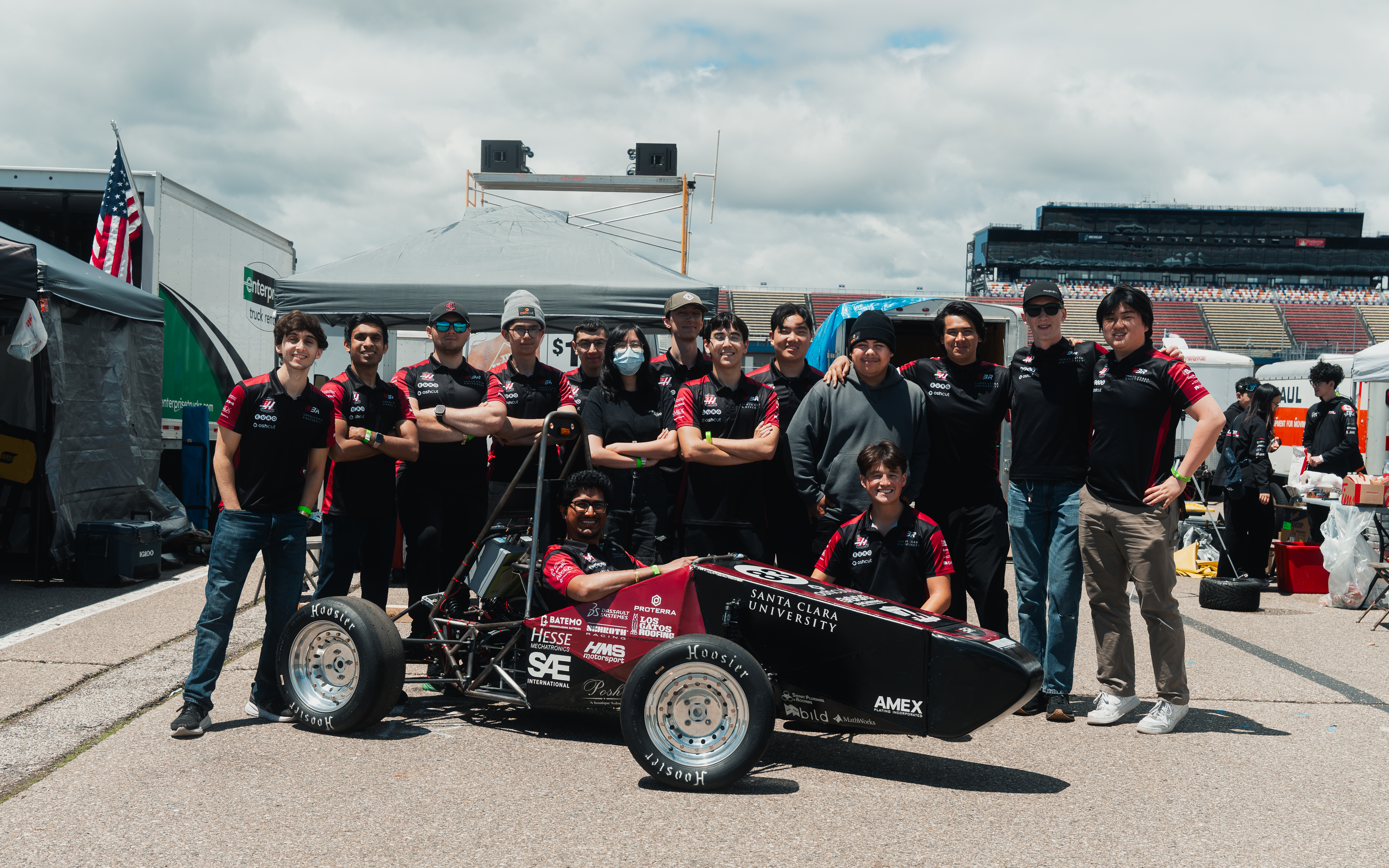 Bronco Racing students with Santa Clara University’s Formula SAE electric car